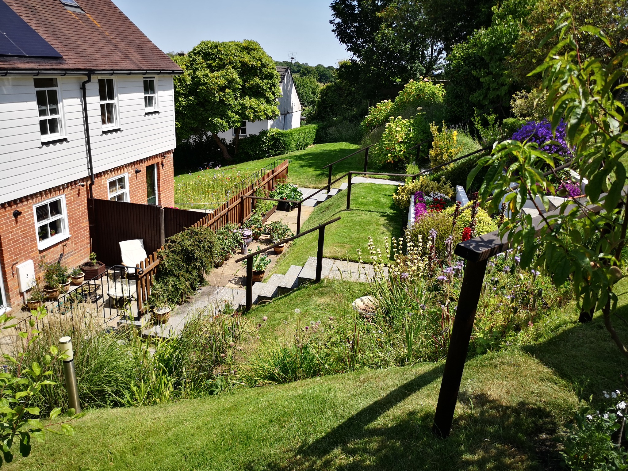 Lawn Cut, Tidy-up, Rail and Planter Painting, Paths Jet Washed